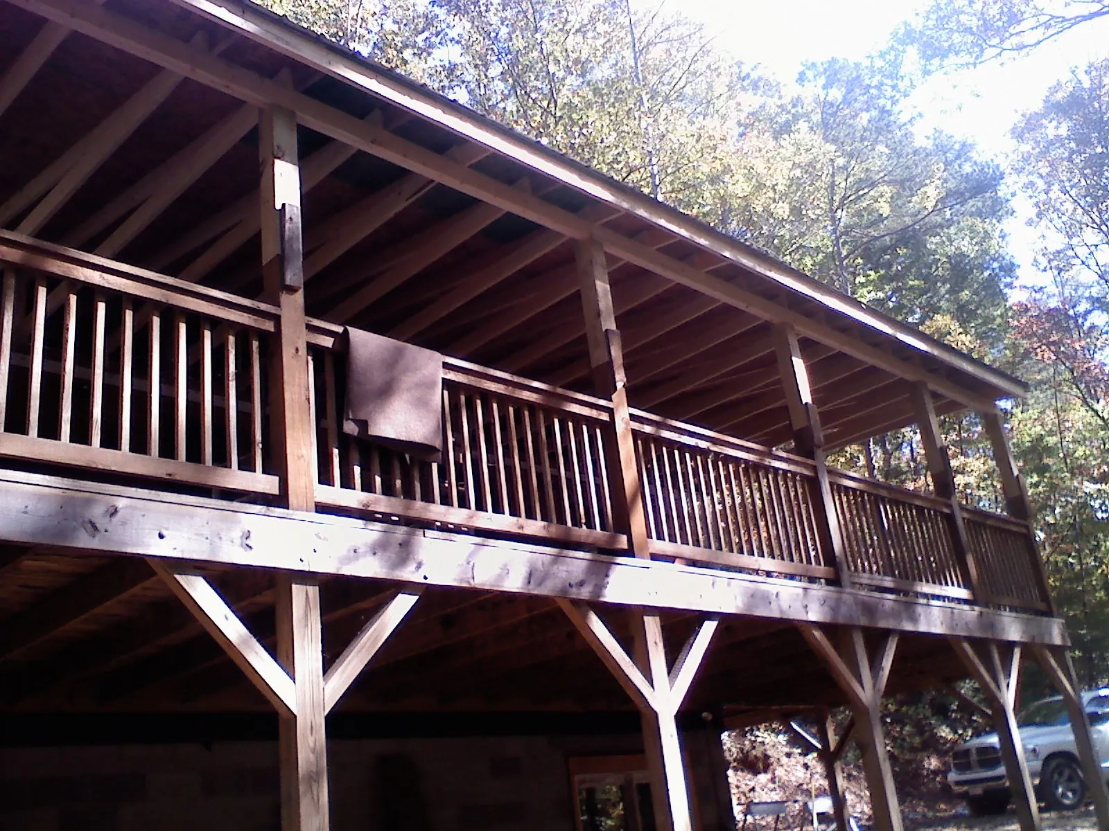 Timber framing under a new elevated porch and deck — Roof Leak Repair in Cedarburg by Roofing Brothers